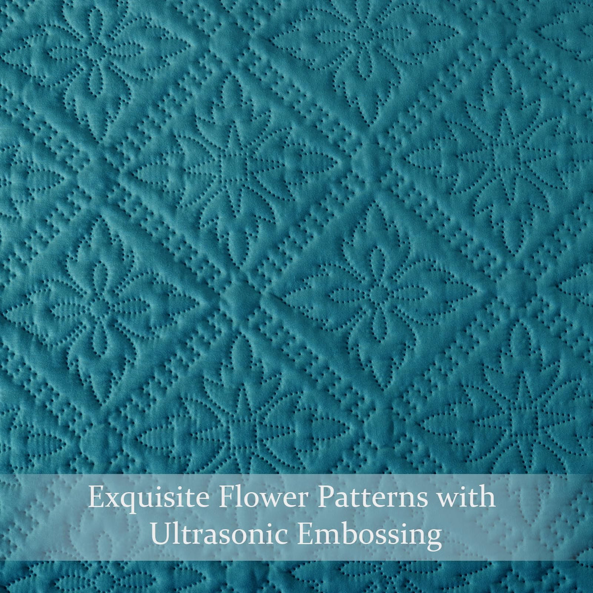 Exclusivo Mezcla teal quilt creates a modern focal point in any bedroom.