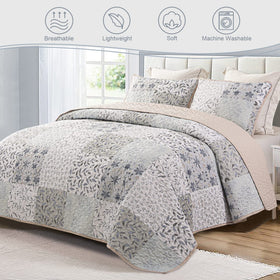 Exclusivo Mezcla queen quilt bed setup showcases chic patchwork for all-season comfort.