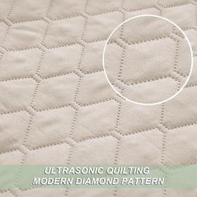 Exclusivo Mezcla reversible quilt with pillow shams in Brich Beige set.