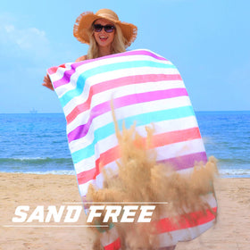 Exclusivo Mezcla towel extended to 30x60 inches for comfortable lounging.