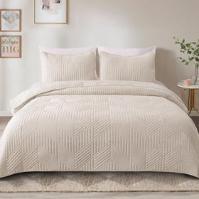 Exclusivo Mezcla Ultrasonic King Quilt closeup shows embossed pattern and durability