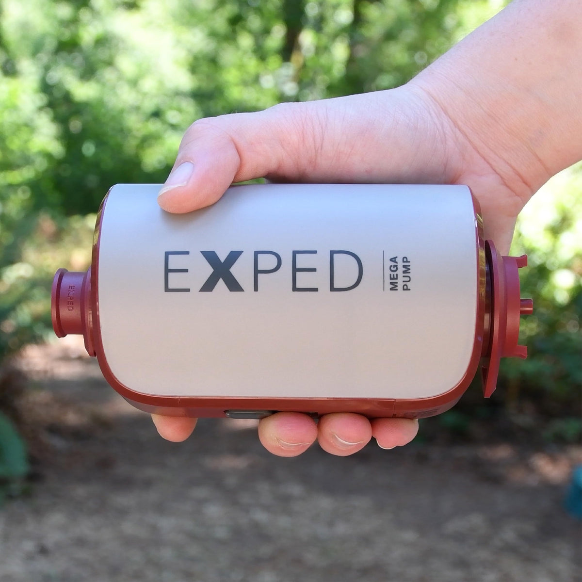 Exped Mega Pump with universal adapters to fit most sleeping pads.