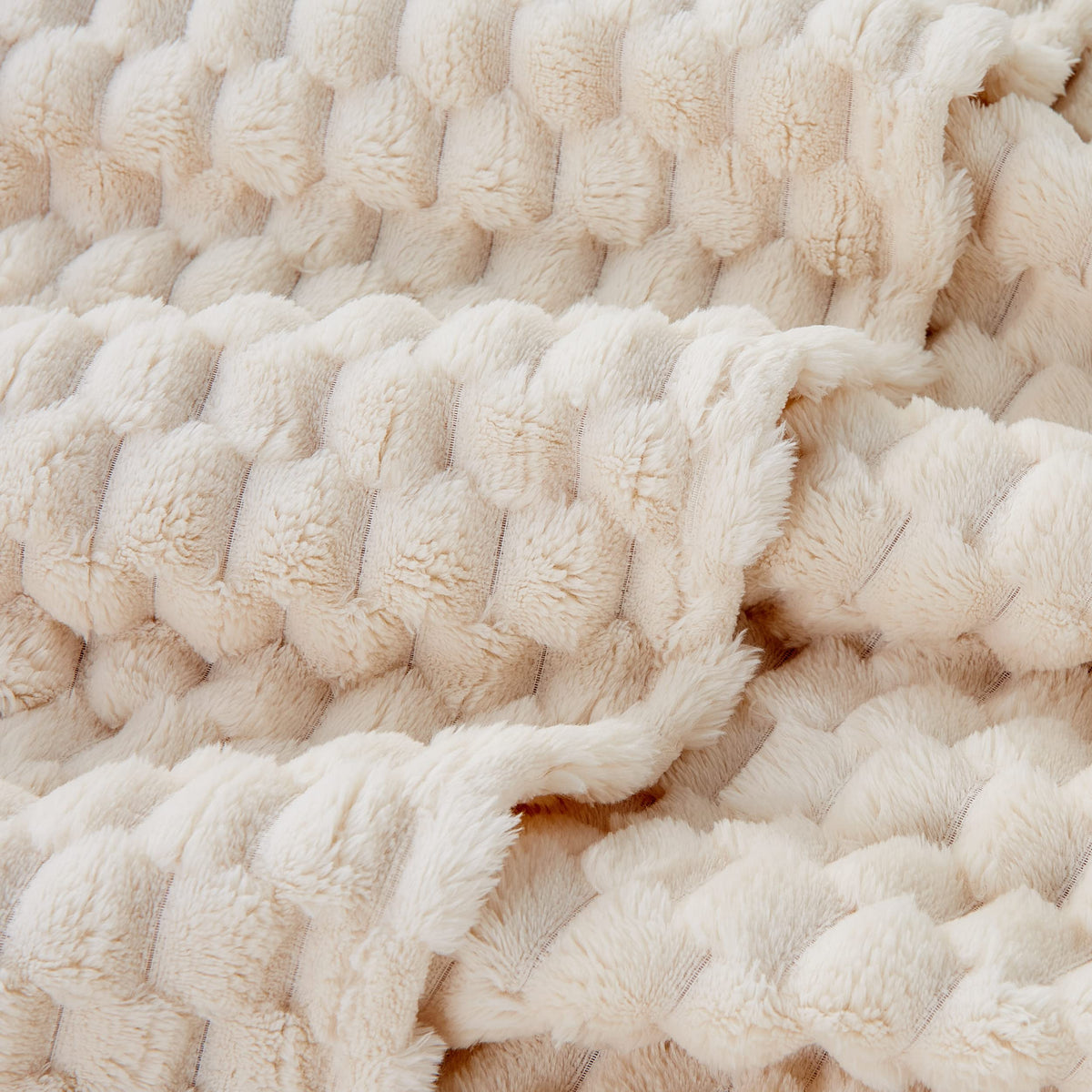 EXQ Home all-season blanket for indoor and outdoor use.