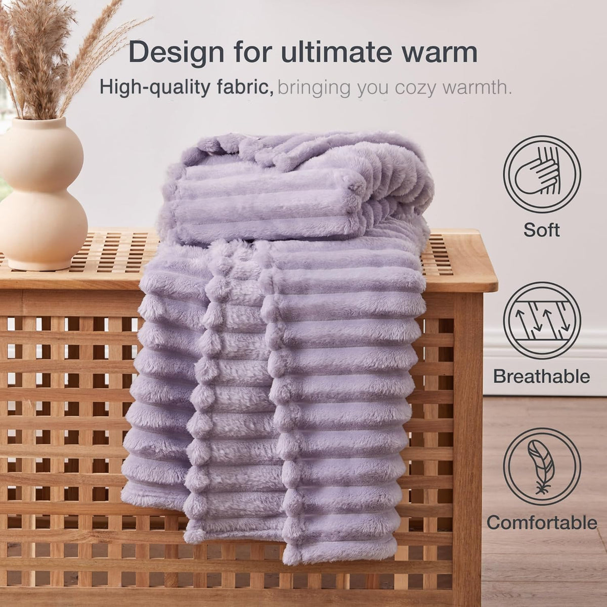 EXQ Home fleece blanket displayed on sofa to enhance living room style