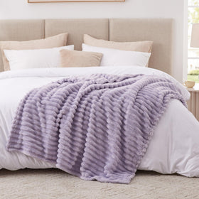 EXQ Home fleece blanket close-up shows soft texture for comfort