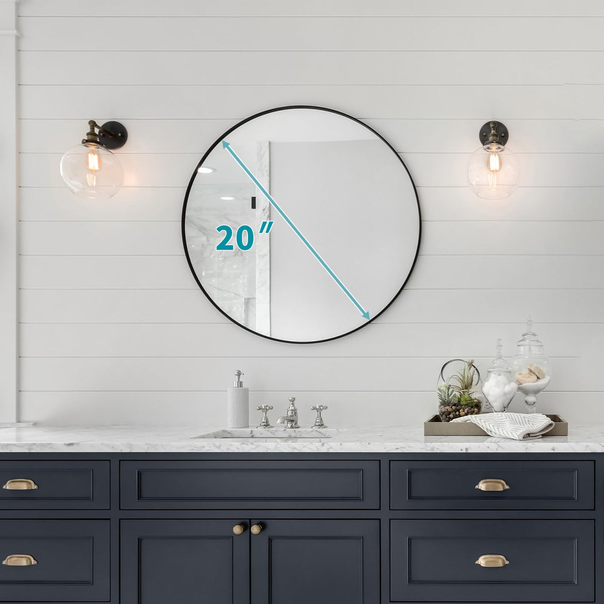 Fabuday matte black frame detail on round mirror for contemporary styling
