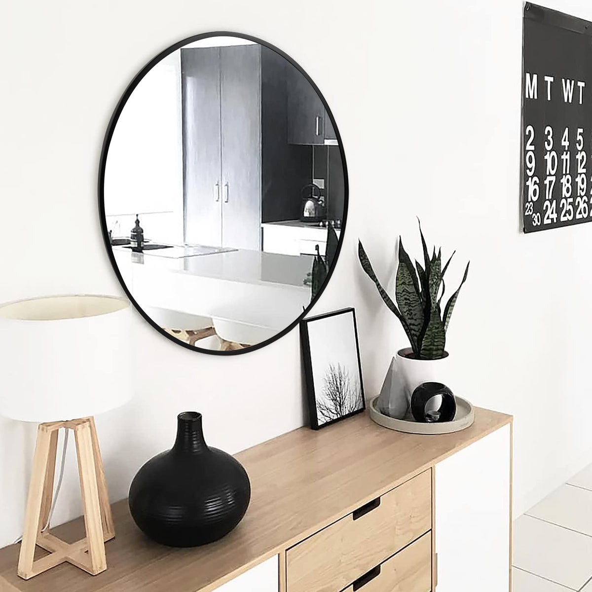 Fabuday round mirror used as entryway decor for a welcoming look
