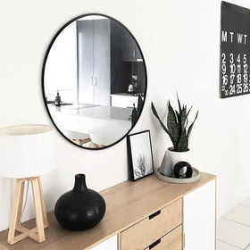Fabuday round mirror used as entryway decor for a welcoming look