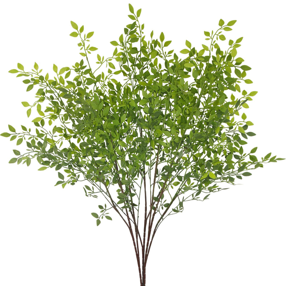 FAICOIA nandina branches in a tall vase create a dramatic 110 cm centerpiece with easy upkeep.