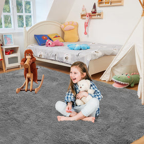 Fairblink 5x8 fluffy rug in living room demonstrates modern style and comfort.