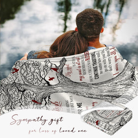 FAIVHSO bereavement blanket on a sofa conveying warmth and remembrance.