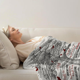 FAIVHSO blanket draped on bed for cozy evenings.