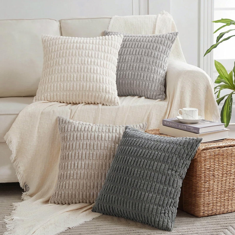 Fancy Homi striped grey pillow cover enhances living room decor.