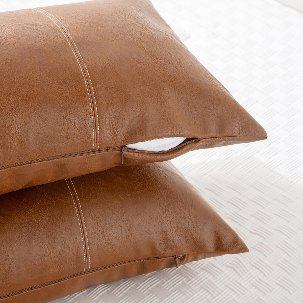 Fancy Homi faux leather texture demonstrates durable, easy-care surface