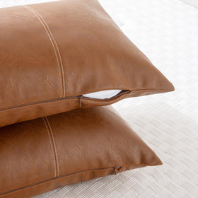 Fancy Homi faux leather texture demonstrates durable, easy-care surface