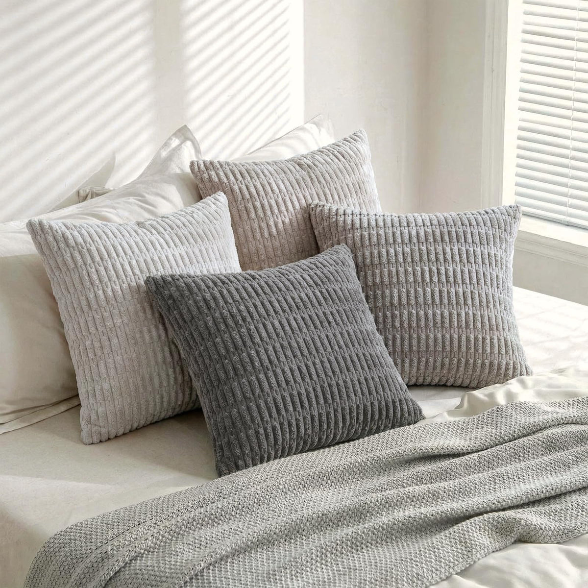 Fancy Homi four-pack includes four pillow covers for quick styling.