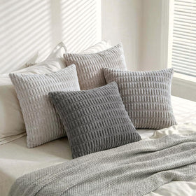 Fancy Homi four-pack includes four pillow covers for quick styling.