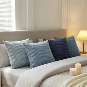 Fancy Homi soft-silky fabric pillow cover offers cozy feel without sacrificing modern look.