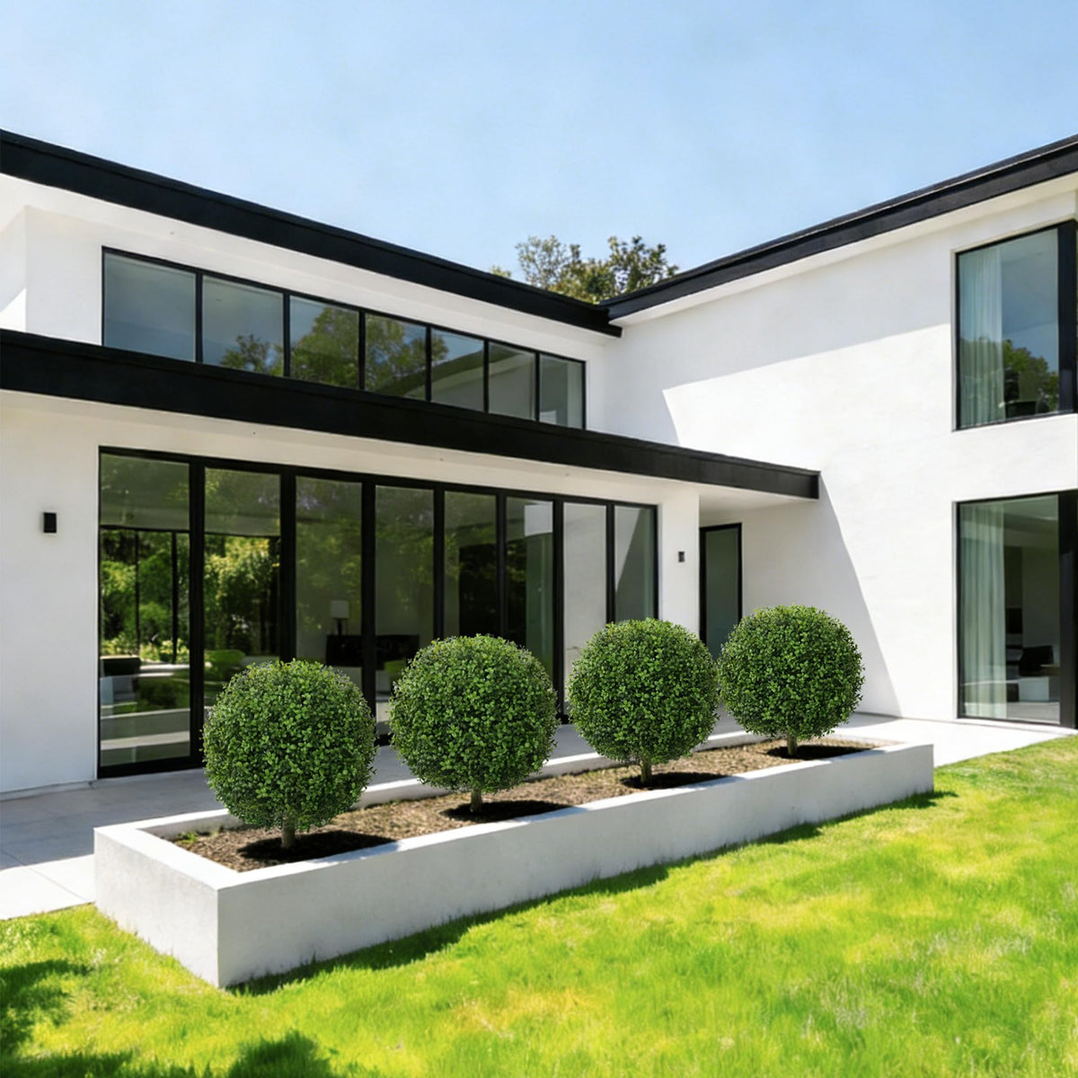 FancyPlus artificial boxwood topiary ball white lotus offers floral sophistication indoors.