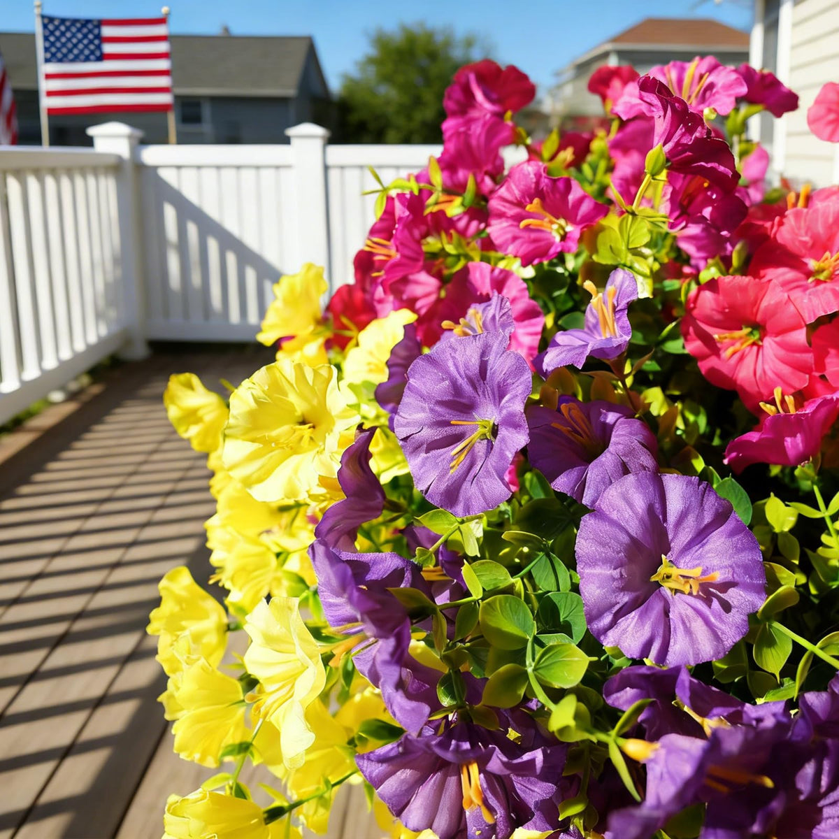 Fanfantoey front porch decor features lasting greenery.
