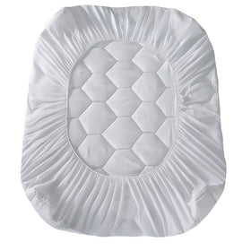 Dorm room setup with Favorland pad enhances sleep comfort.