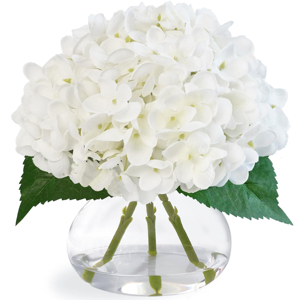 Fawairyc Hydrangea artificial flowers in glass vase with faux water for elegant dining room decor.
