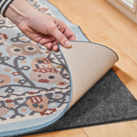 Fchuswty waterproof rug pad 2x6 ft on floor delivers stable non-slip support.