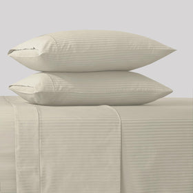 Feather & Stitch New York fabric close-up shows smooth sateen finish and softness.