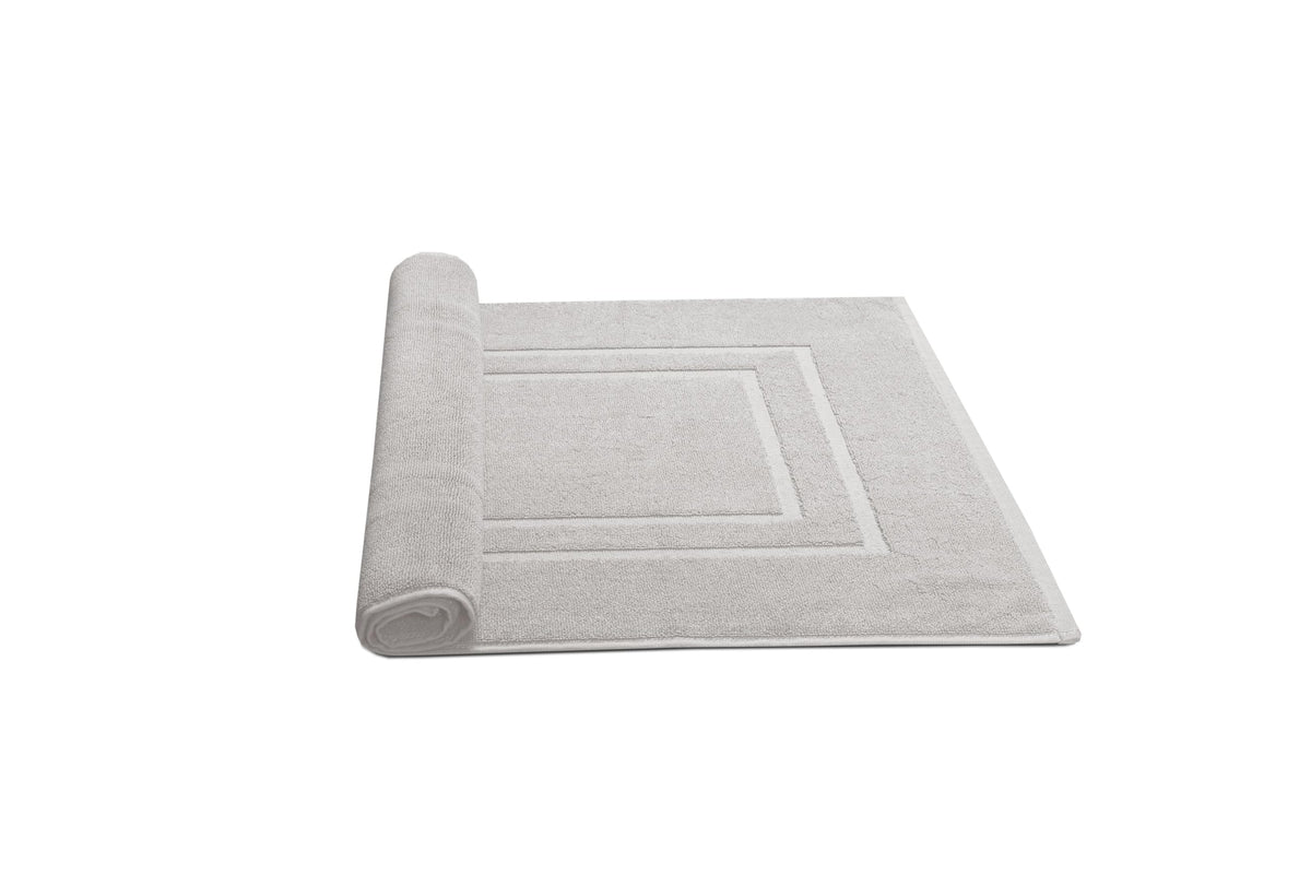 Feather & Stitch New York bath mats close-up texture, showing 1000 GSM plush softness.