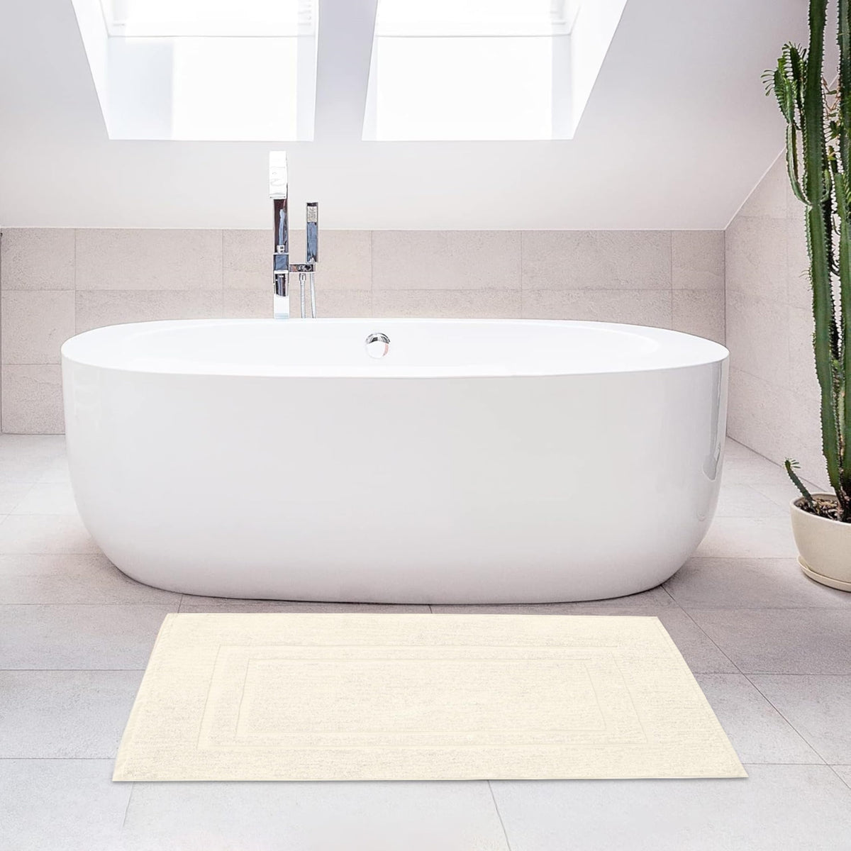 FEATHER & STITCH NEW YORK cozy wrap bath mat offers warmth after stepping out.