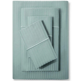 Feather & Stitch New York granite green stripe set shown in a hotel-inspired bedroom for luxury.