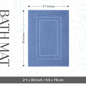 Feather & Stitch New York soft plush finish bath mat in bathroom.