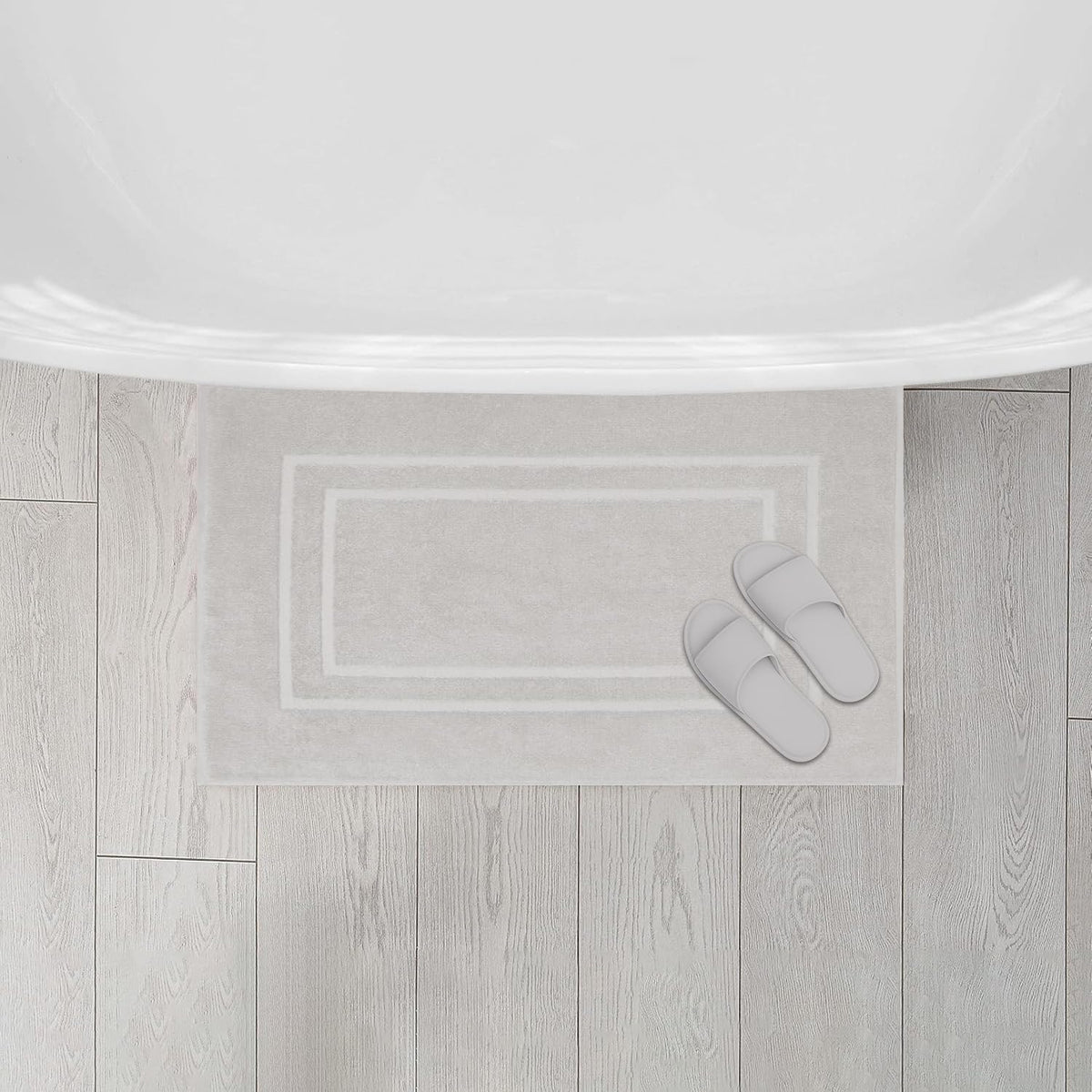 Feather & Stitch New York 2-piece set on tile floor, absorbs moisture quickly.