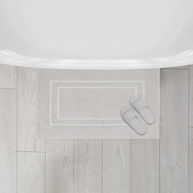 Feather & Stitch New York 2-piece set on tile floor, absorbs moisture quickly.
