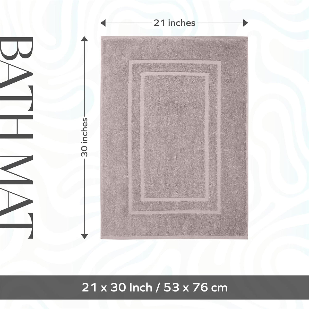 Taupe Feather and Stitch New York bath mat highlights soft cotton terry under feet.