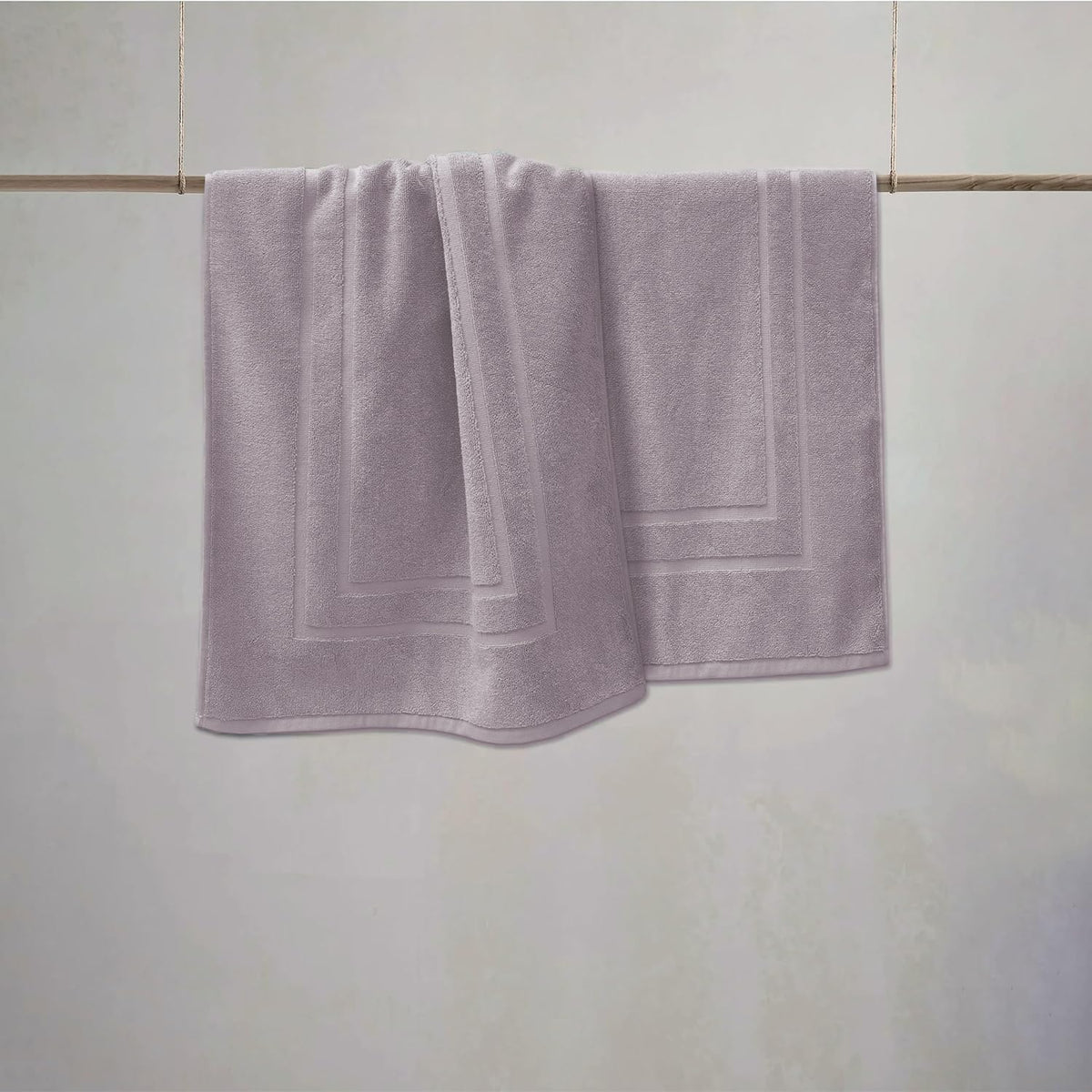 Close-up of plush cotton terry on Feather and Stitch New York bath mat 30x21 in.