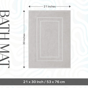 Feather & Stitch New York two-piece mat set, packaged presentation, spa-like comfort.