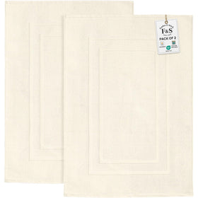 FEATHER & STITCH NEW YORK ultra-absorbent bath mat soaks moisture quickly after showers.