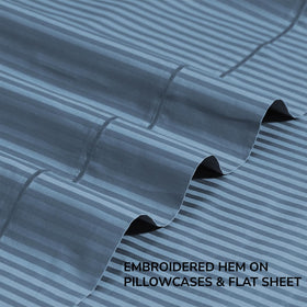 OEKO-TEX certified label on Feather & Stitch bed sheets ensures safety and quality