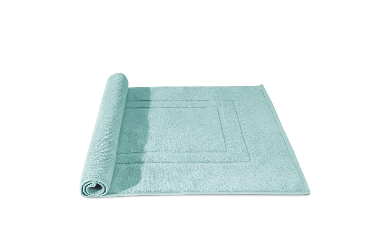 Feather & Stitch Sea Foam bath mat close-up highlights soft plush texture.