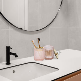 FEILANDUO pink glass bathroom set on counter elevates space
