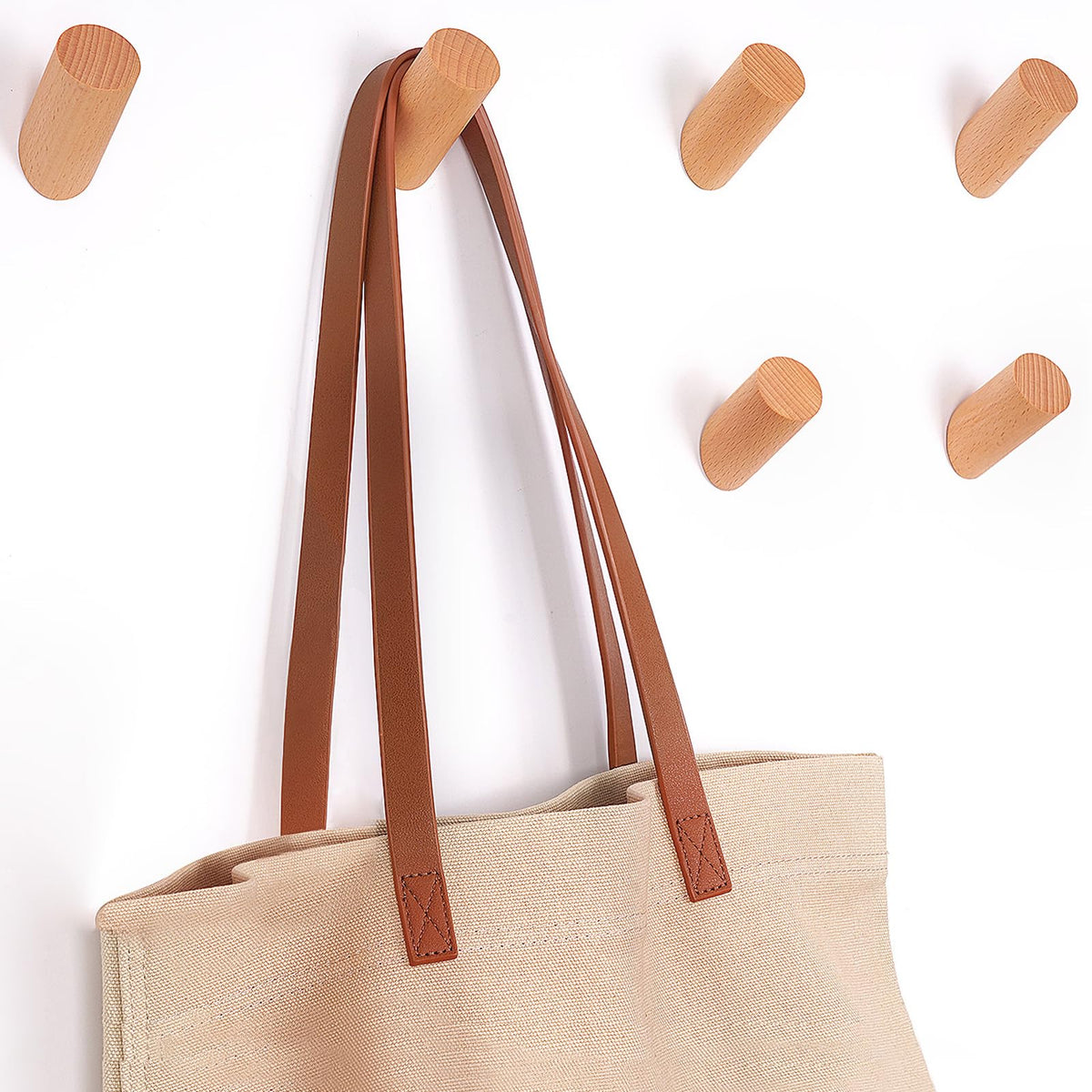 Felidio beech wood wall hooks six-pack displayed, organized entryway and closet space.