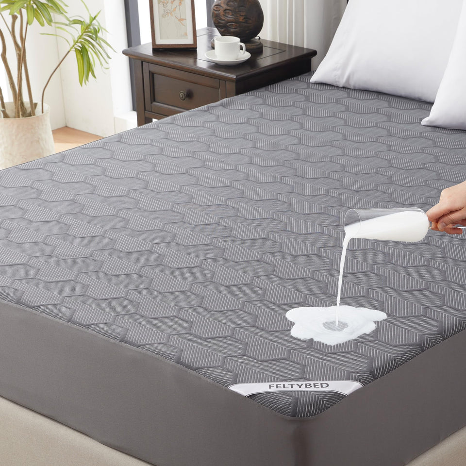 FELTYBED king-size waterproof mattress protector on bed demonstrating full 360° protection