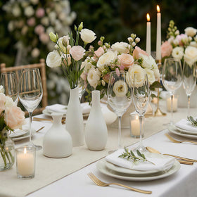 Fenravian mini vases used as wedding centerpiece accents.