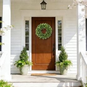 FestalMart boxwood wreath complements farmhouse decor on doors and porches.
