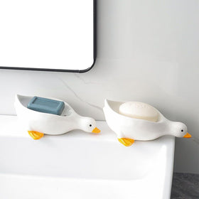 Fewile ceramic soap tray doubles as decor and soap rack.