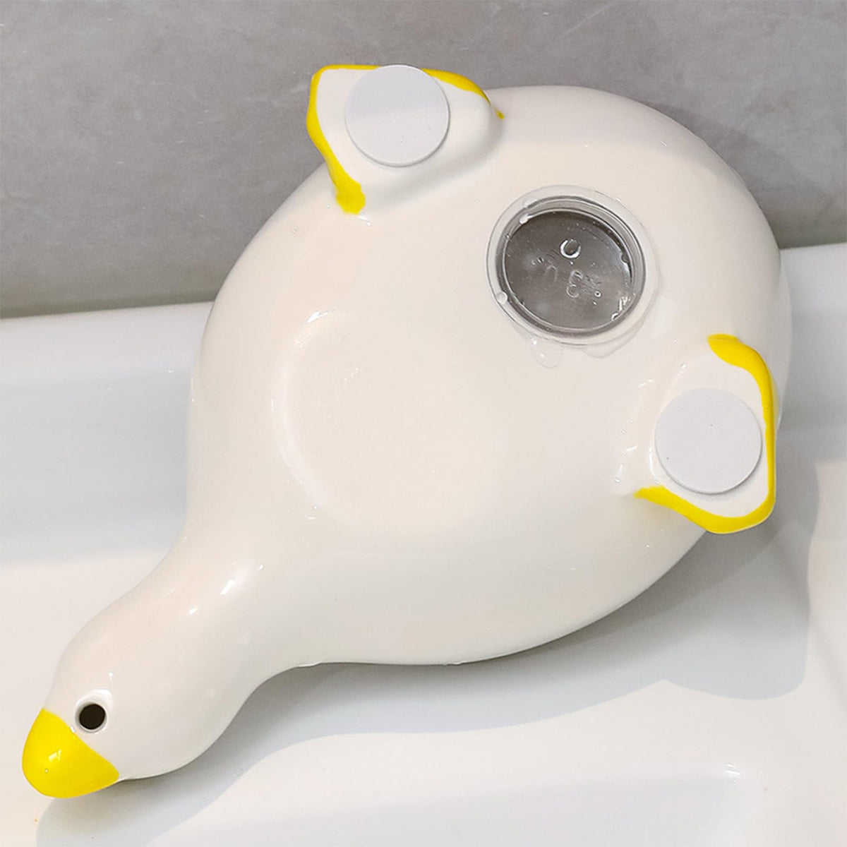 Fewile duck shower soap dish keeps soap accessible and ventilated.