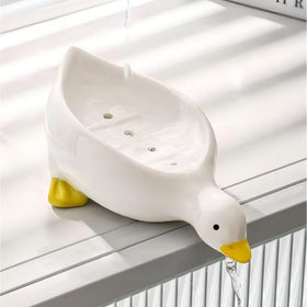 Fewile duck sponge holder keeps sponges dry and organized.
