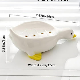 Fewile white duck soap holder adds charm while drying soap naturally.
