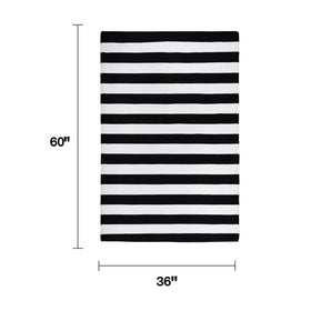FH Home Brittany striped rug on patio with furniture and plants